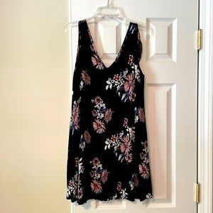 Boutique black dress with floral details. Size M.